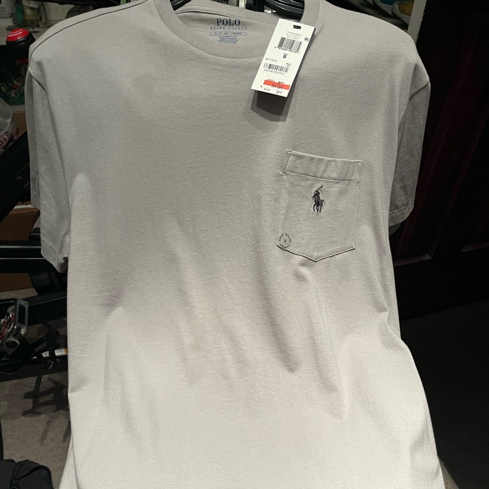 (2) Two brand new polo shirts